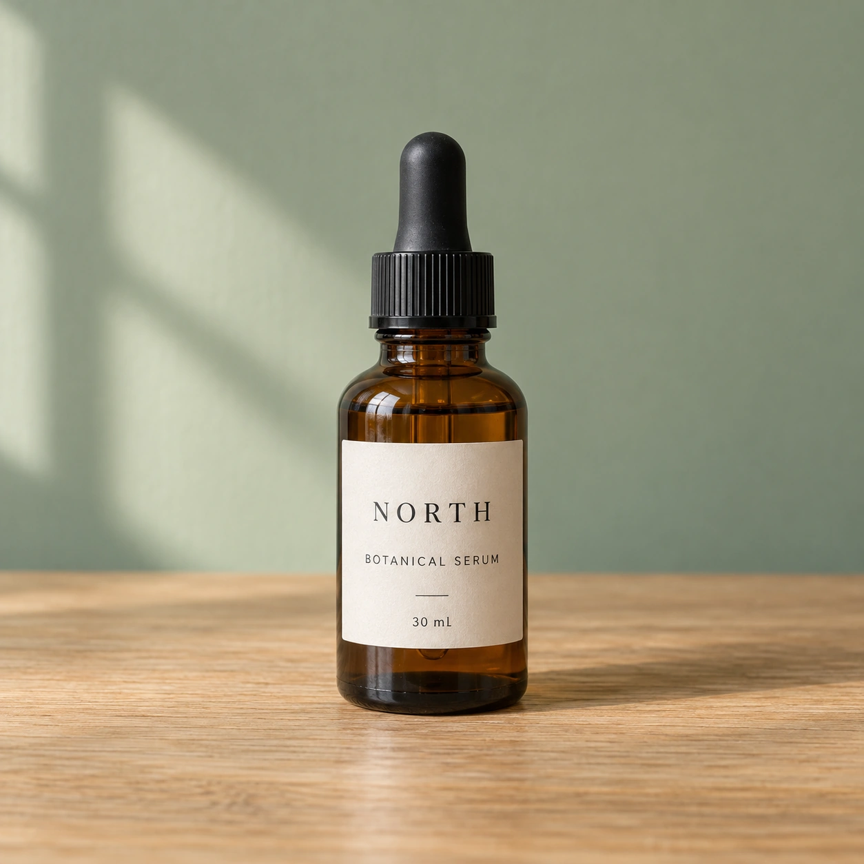 Original amber NORTH serum bottle on a wooden tabletop against a green wall